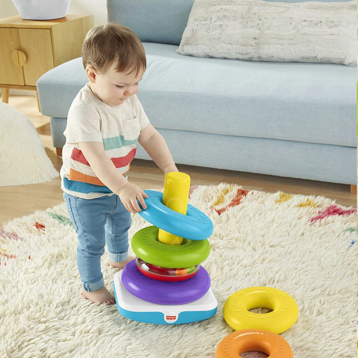 FISHER-PRICE giga piramidka z kółek – dziecko układa kolorowe kółka na bujającej podstawie