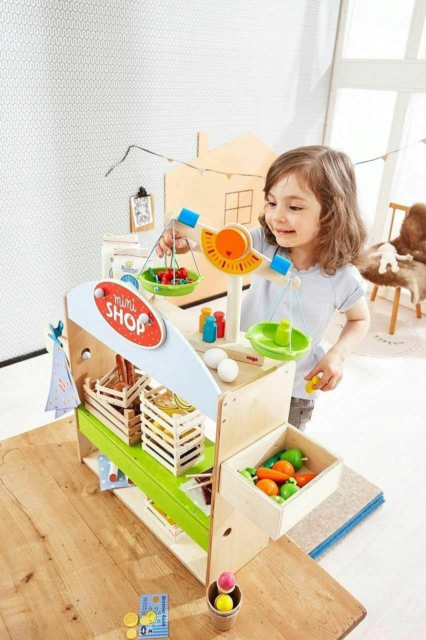 HABA drewniana waga sklepowa z odważnikami i ciężarkami, dziecięca zabawka do sklepu