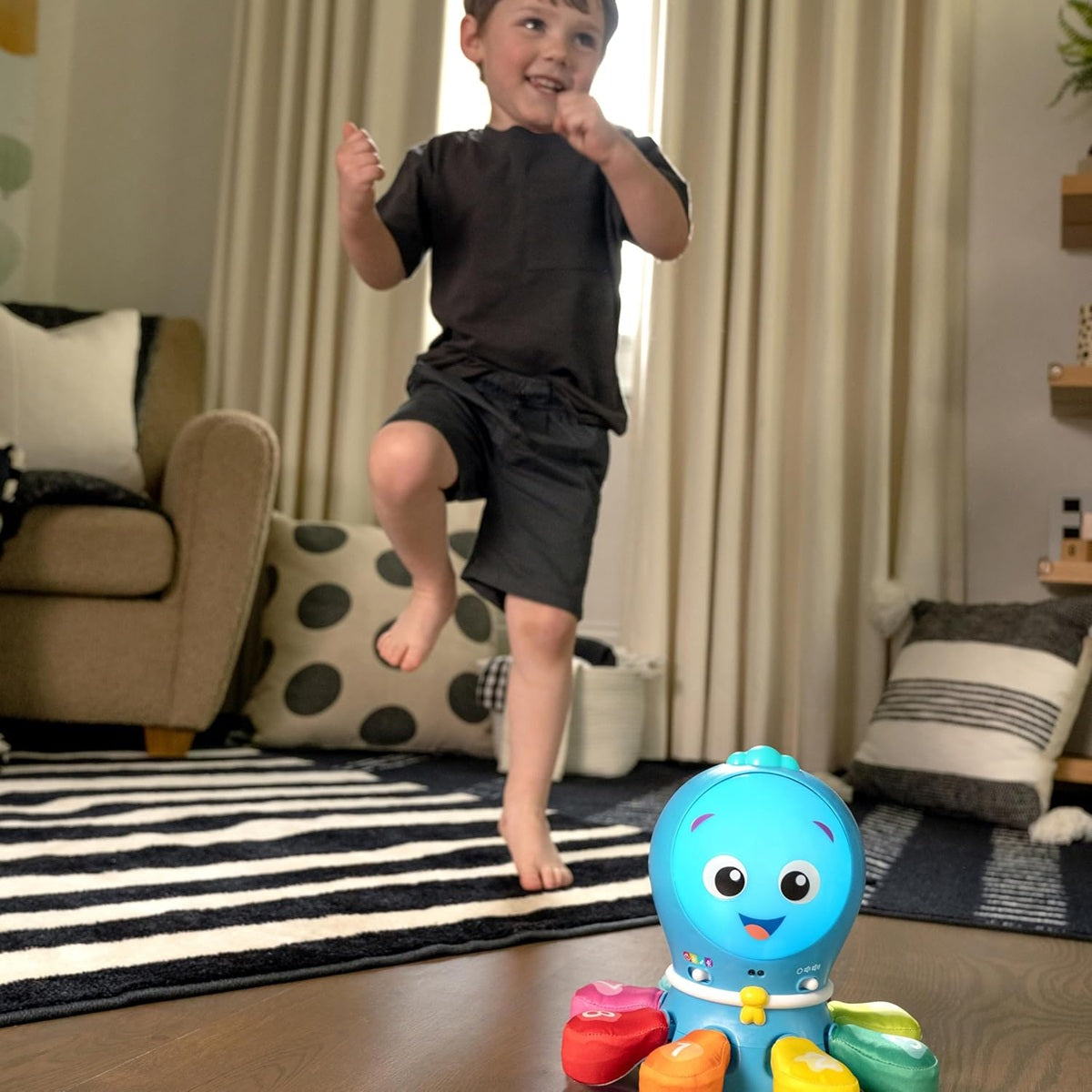 BABY EINSTEIN interaktiver Krake Sätze Melodien Lichter Bewegung 4 Sprachen