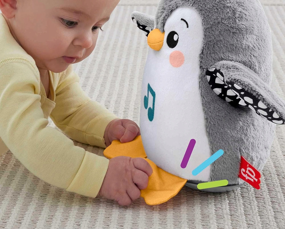FISHER-PRICE HNC10 Wipp-Pinguin mit Melodien 21 cm
