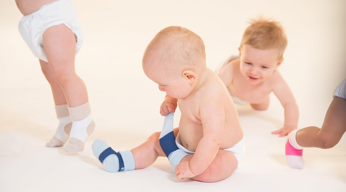 SOCK ONS protège-chaussettes 0-6 m