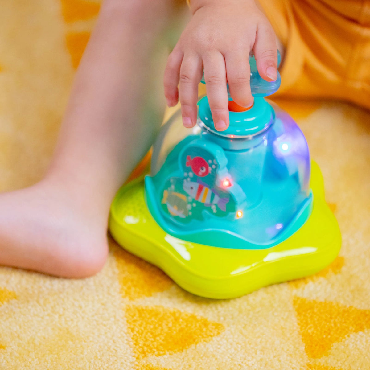 Bright Starts Press Glow Spinner muzikaal speeltje 6m+
