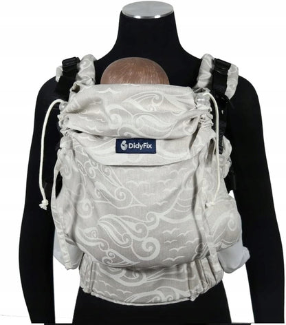 DIDYMOS DidyFix nosidełko ergonomiczne 0-25kg beżowe z tłoczeniami, noszenie przodem do rodzica na manekinie