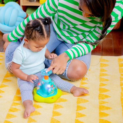 Bright Starts Press Glow Spinner muzikaal speeltje 6m+