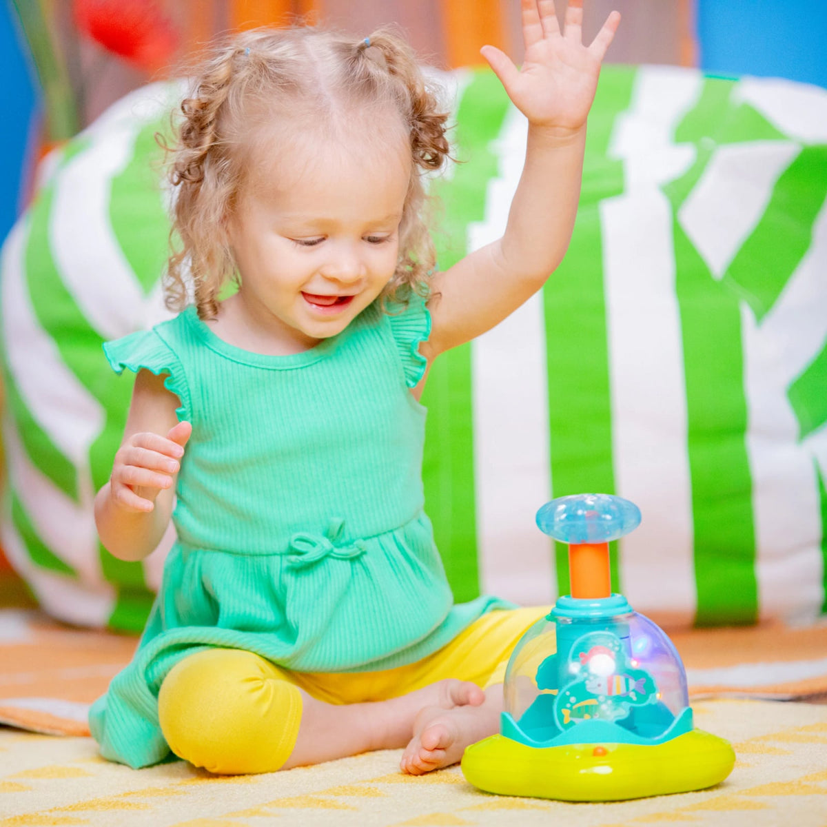 Bright Starts Press Glow Spinner muzikaal speeltje 6m+