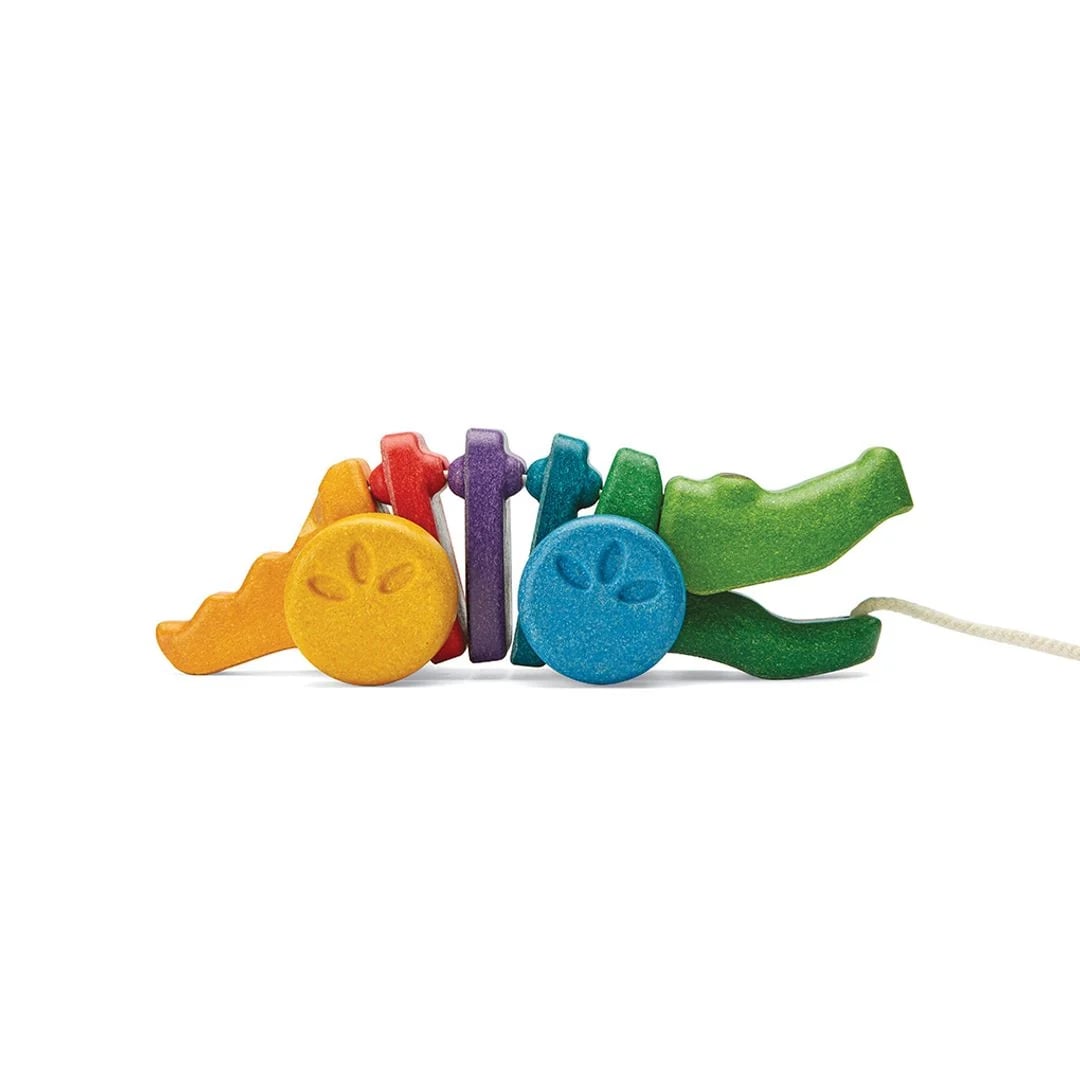 Tęczowy aligator PlanToys widziany z boku