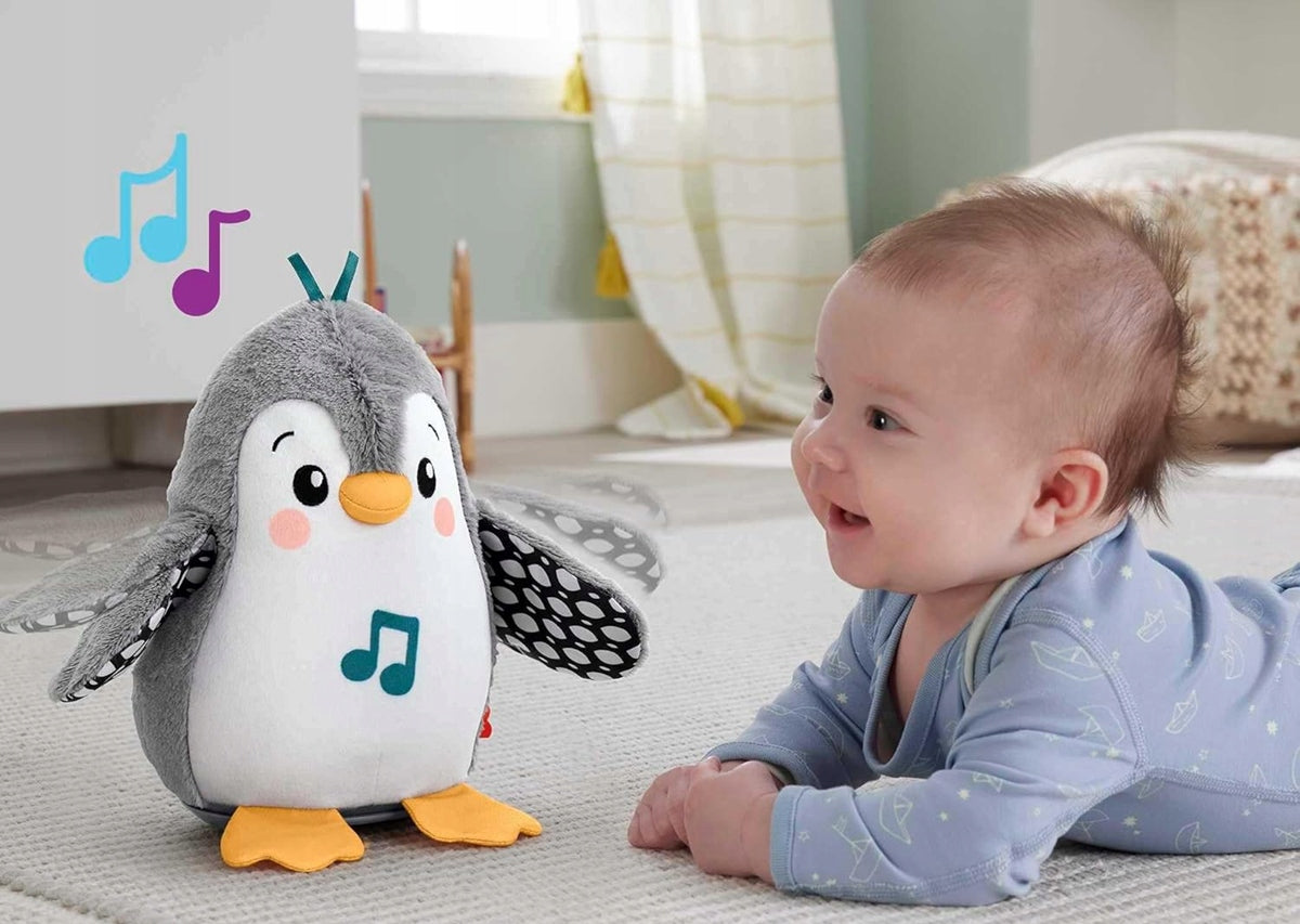 FISHER-PRICE HNC10 ringatózó pingvin dallamokkal 21 cm