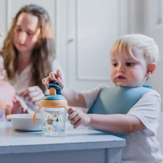 SUAVINEX Learning Cup cană anti-picurare cu gură rigidă 200 ml 6 luni+