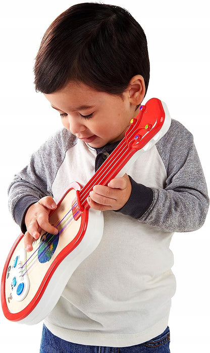 HAPE Baby Einstein ukulele 43 cm drewno, plastik, czerwone ukulele edukacyjne dla dziecka bawiącego się na białym tle